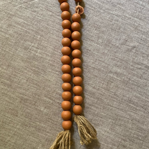 Solis Handcrafted Terracotta Beaded Garland | Pottery Barn SONOMA Handcrafted Terracotta Beaded Garland